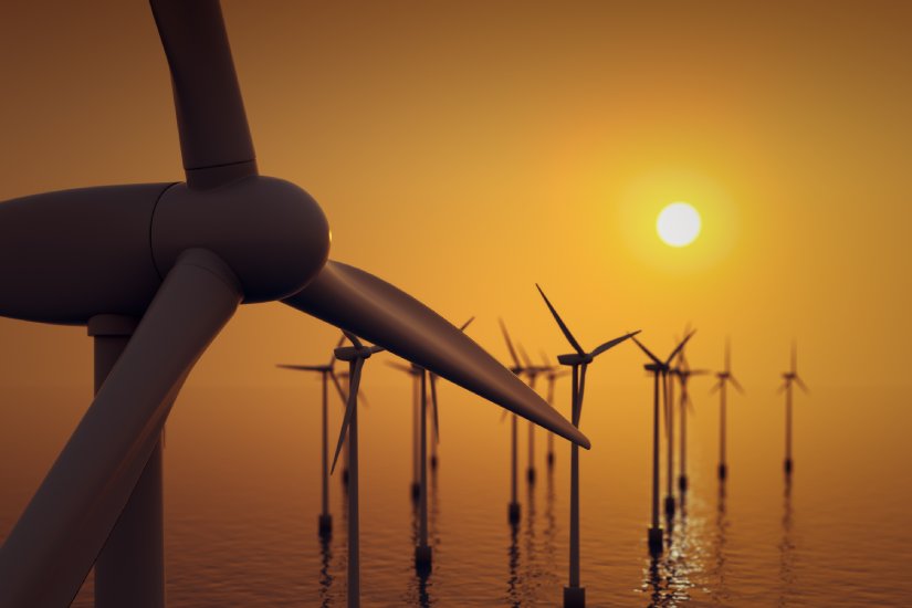 a close-up of a windmill at sea
